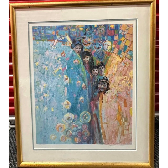 This image appears to be a framed art print featuring a colorful painting of several faces and figures against a blue and...