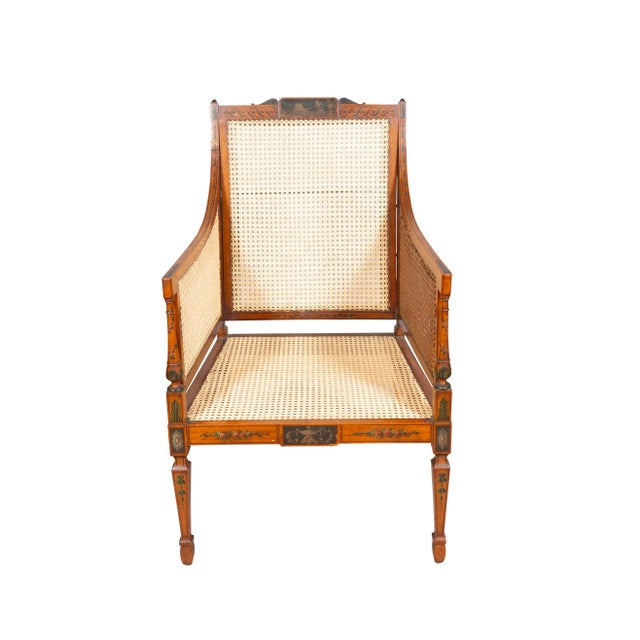Edwardian Satinwood and Painted Armchair with mostly all new caning. Finely painted. With square back with chariot and...