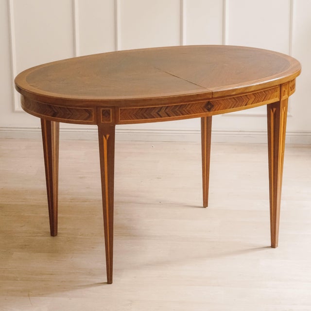 Oval dining table in the louis xvi style, its design language is based on the classical furniture tradition. The oval top,...