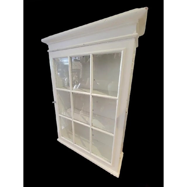 A wonderful vintage painted white 9 panel glass wall medicine cabinet. The cabinet is very large and heavy. Made of solid...