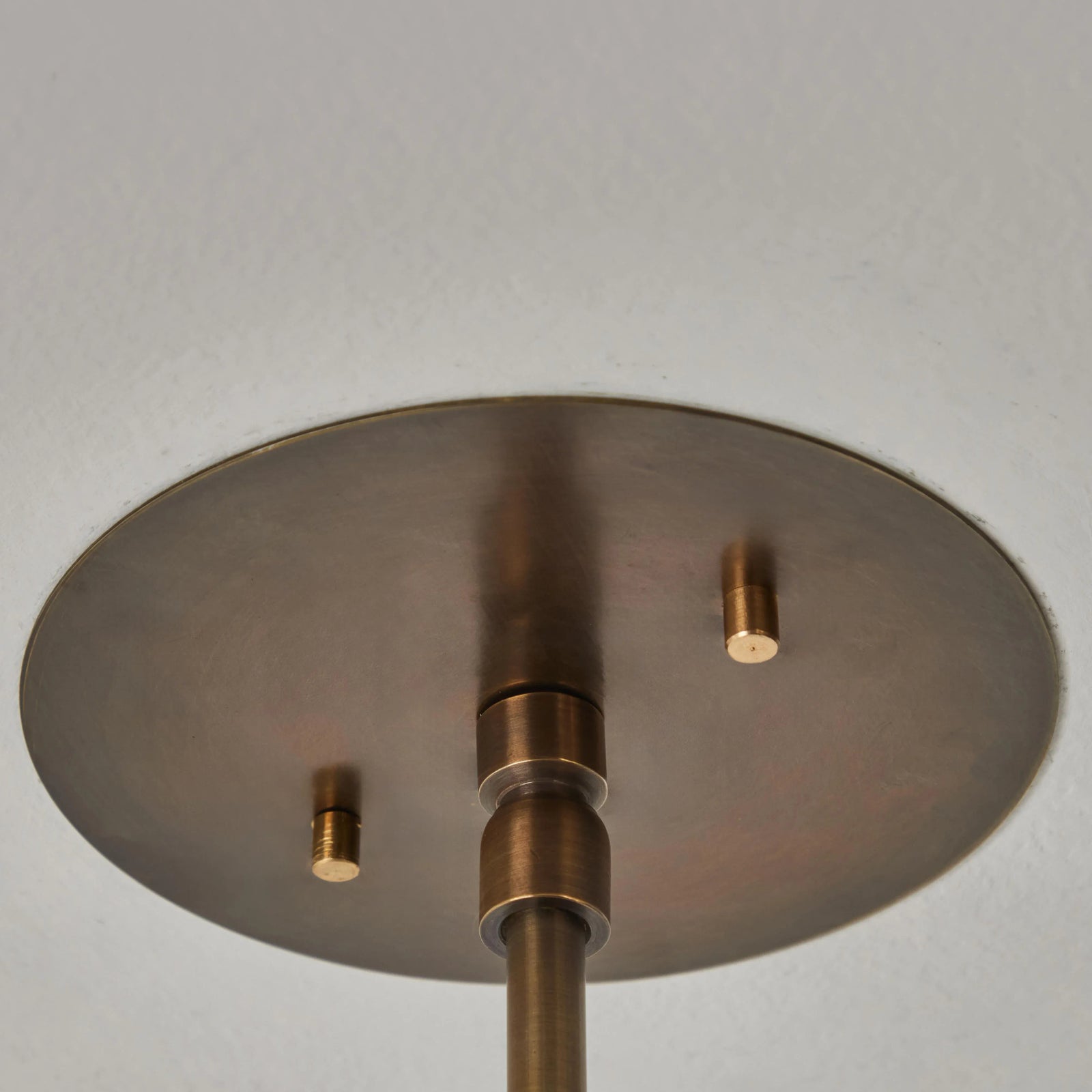 Two Enlighten 'Rey' Perforated Patinated Brass Dome Ceiling Lamp
