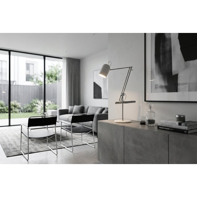 Refined table lamp by reggiani, a renowned name in italian lighting design, produced in the 1970s. an iconic model that...