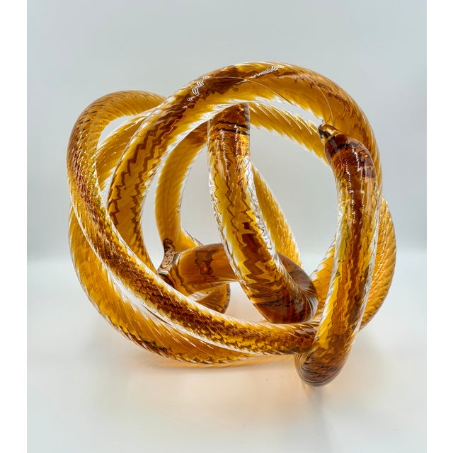 Discover the timeless elegance of this exquisite vintage Murano hand-blown art glass sculpture, a true testament to the...