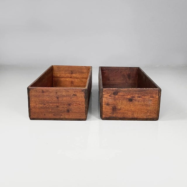 Italian industrial wooden rectangular crates or boxes, 1920s Pair of rectangular crates entirely made of wood. The wood of...