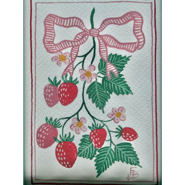 Repro print of UK artist’s original watercolor of a bunch of strawberries with ribbons, signed on recto in the print, on...