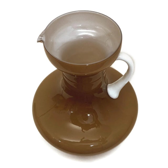 Vintage Caramel / White Italian Cased Pitcher, Empoli Cased Glass 9¼” x 6½ Empoli Cased Glass was popular during the 1950s...