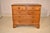 19th century chest of drawers from England, made from Hungarian Ash wood. The wood gives the entire piece almost a glowing...