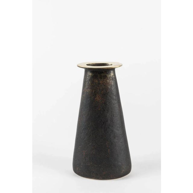 Carl Auböck model #3975 brass vase. Designed in the 1950s, this incredibly refined and sculptural Viennese vase is...