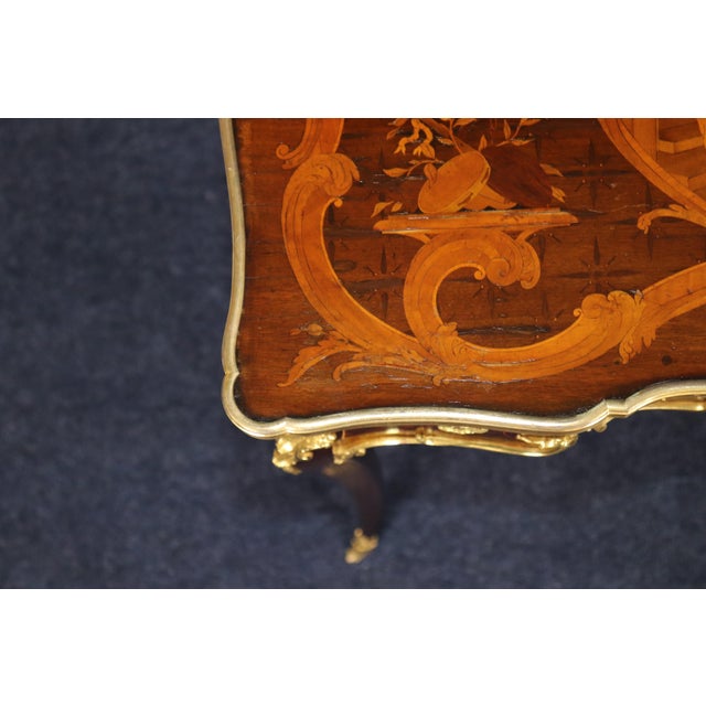 An exceptional and highly decorative 19th-century French marquetry writing desk by Mathieu Béfort, known as Béfort Jeune...