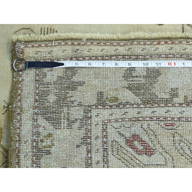 This exquisite antique Karabagh rug, dating back to the early 1900s, showcases the refined artistry and romantic palette...