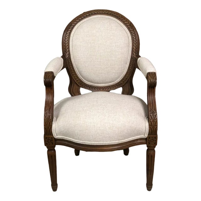 Louis XVI Style Carved Walnut Armchair with Beige Upholstery For Sale