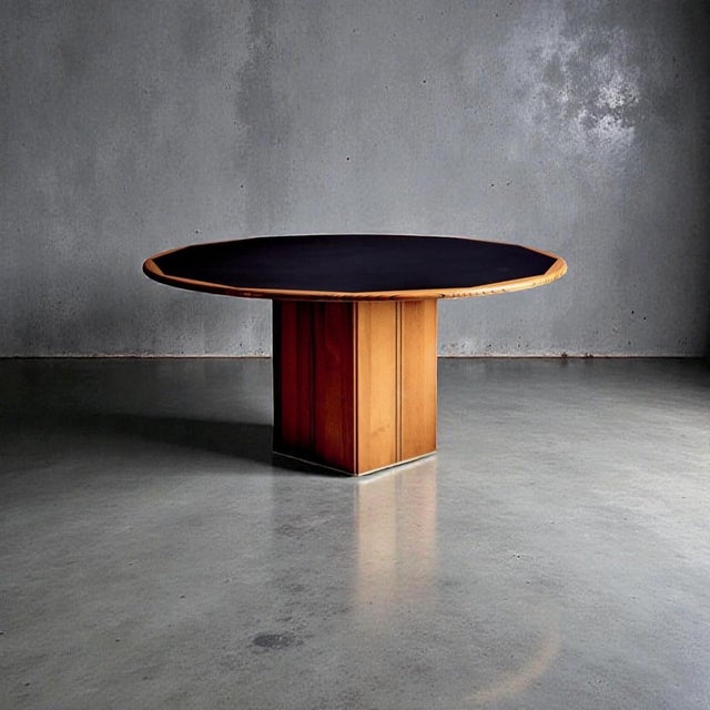 Afra & Tobia Scarpa for Maxalto "Africa" round dining table with the sought-after black lacquered top. This exquisite...