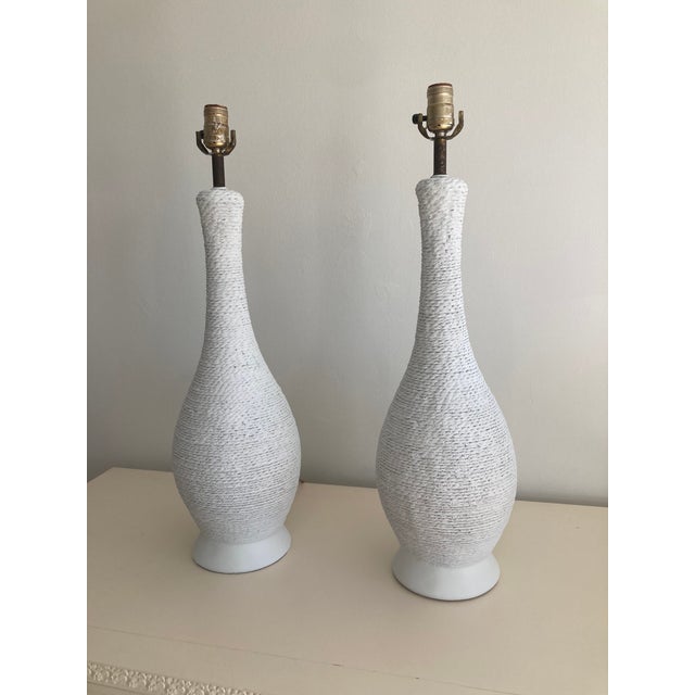 Very interesting pair of Plaster Faux Wicker Serge Roche Style Table Lamps. Unusual to have a pair and such great...