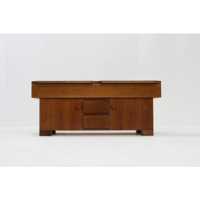 Vintage Italian Torbecchia sideboard in solid veneered walnut wood. Designed by Giovanni Michelucci for Poltronova in the...