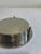 Beautiful vintage silver-toned coaster set with matching holder. Includes 6 round coasters with delicate floral and scroll...