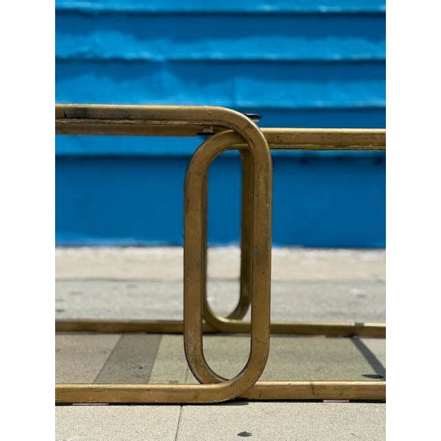 We just got this set of nesting tables that can turn into a coffee table in the style of Milo Baughman. Consists of a...