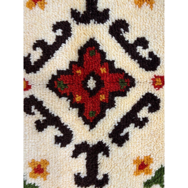 Wool pile genuine hand made American Hooked rug .