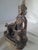 Add a striking piece of traditional Asian artistry and symbolism to your collection with this finely cast bronze sculpture...