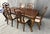 This elegant 7-piece banded dining set showcases a classic traditional design with a beautifully shaped tabletop, rich...
