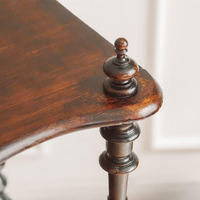A etagere dating from around 1860, belonging to the Louis-Philippe style, with three superimposed shelves on turned...