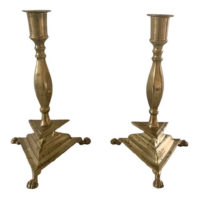 Pair of Neoclassical Brass Paw Foot Candlesticks For Sale