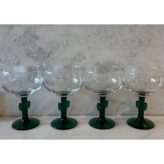 Set of 4 vintage margarita glasses featuring a green Saguaro cactus stem and a clear bowl. Made by Libbey circa 1980s-1990s.