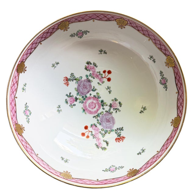 A beautifully decorative vintage Chinese famille rose porcelain bowl featuring exuberant hand-painted floral decoration in...