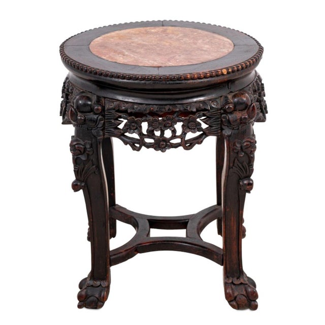 Chinese Carved Hardwood and Marble Circular Low Pedestal Table, late 19th century, the circular inset top above a carved...