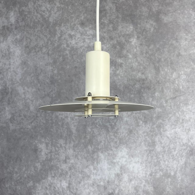 Small vintage ceiling lamp, lyfa model 4020, still with the original tag. denmark, 1970s made of metal with an elegant...