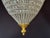 A refined 1980 French Louis XVI-style bronze and crystal lantern chandelier, made in Europe and designed with a warm gold...