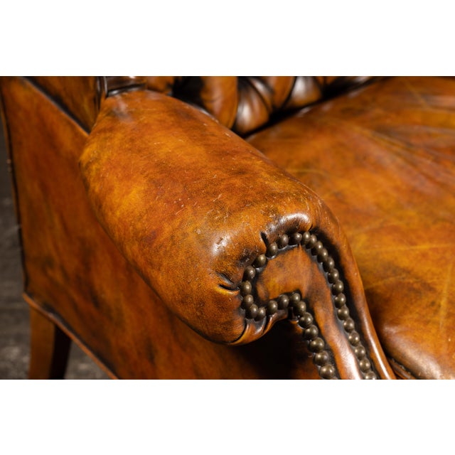 Amber Mid 20th Century Tufted Leather Wingback Armchair in Amber For Sale - Image 8 of 9