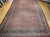 A remarkable example of early 20th-century Persian craftsmanship, this vintage oversized Bidjar rug showcases the timeless...