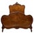 An impressive and finely crafted 19th-century French double bed, beautifully constructed in walnut and distinguished by...