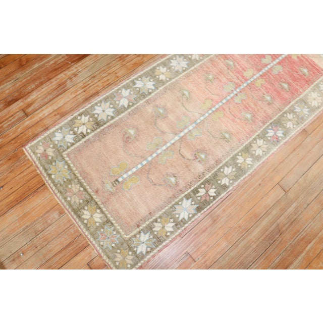 Mid 20th Century Turkish Anatolian Runner with an all-over floral design throughout Measures: 2'7'' x 9'8''.
