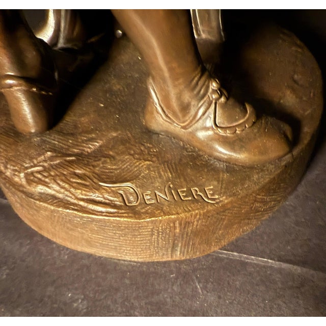 A finely cast 19th-century French bronze sculpture signed Denière, depicting the romantic figures of Faust and Marguerite....