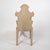 A striking and sculptural mid-century Tyrolean-style side chair, expertly hand-carved from bleached and varnished solid...