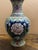 A beautifully handcrafted vintage Chinese cloisonné enamel vase featuring an elegant pink peony surrounded by intricate...