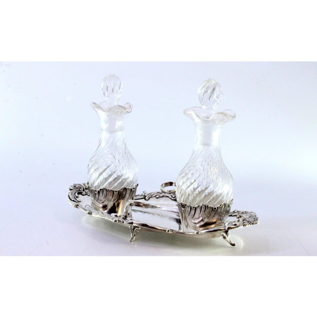 Altar Cruets in Embossed Silver, Set of 2, in Very Good conditions. Designed before 1890 This piece has an attribution...