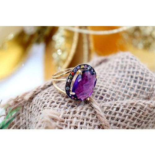 Gold ring with cut amethyst and colored quartz. Metal: Gold. Origin: Portuguese. Brand: Veado. Weight: 8.92 grams....