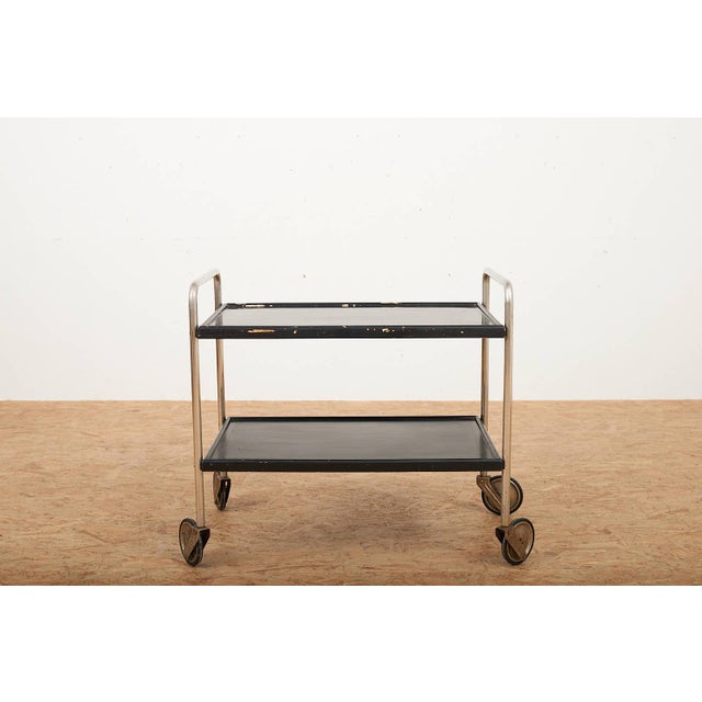 Servierboy in Chrome-Plated Steel Tubing, Casters, and Wood from Ebo AG, 1954, in Good conditions. Designed 1950 to 1959 I...