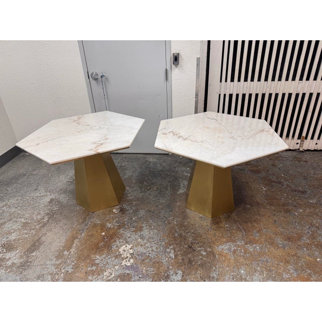 Design Plus Gallery presents a Pair of the Demetria Dining Tables by Noir. The geometric design pairs a hexagonal slab of...
