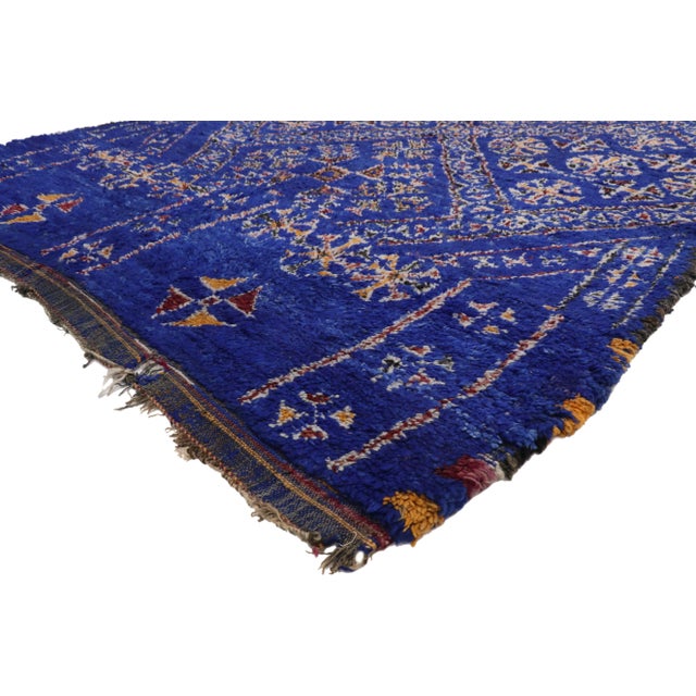 Vintage Indigo Beni Mguild Rug, Berber Blue Moroccan Rug with Tribal Style 06'10 x 10'06. Featuring a luminous sapphire...