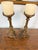 Add a dramatic touch of old-world elegance to your home with this beautiful matching pair of ornate vintage brass candle...