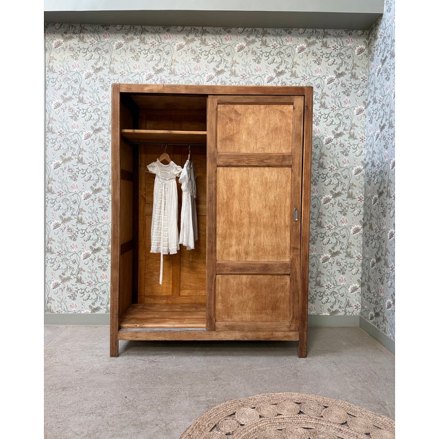 Add character to your home with this large parisian wardrobe with sliding doors, a statement piece that embodies the...
