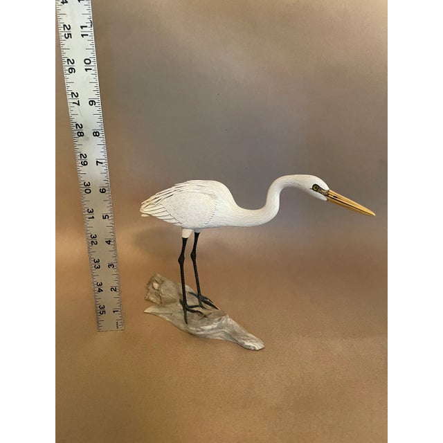 Eastville, Virginia, circa 1980's. Beautifully rendered hand-carved and painted wood crane Original paint and excellent...