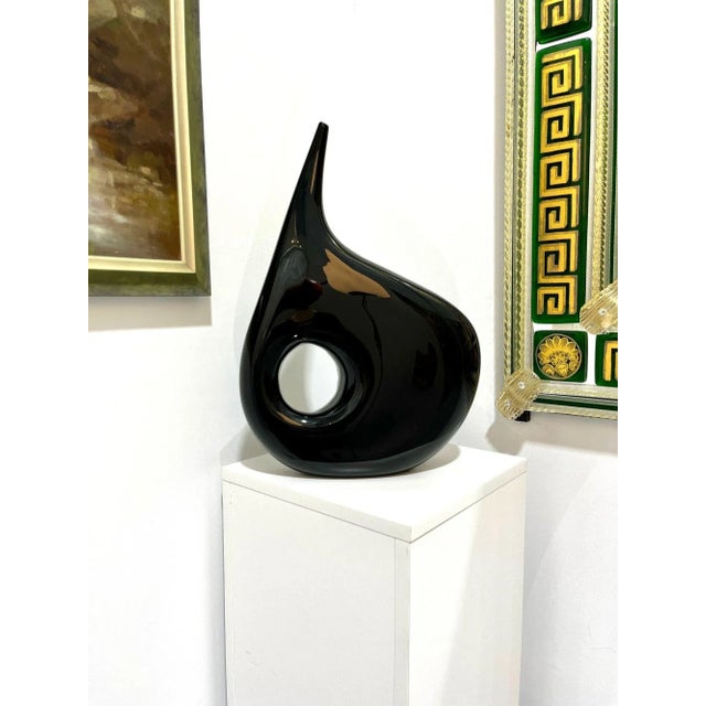 "Black Hole" was designed by the Vivarini Furnace in Murano. Great contemporary flare and design. There is a matching...