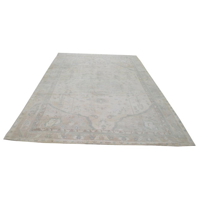 Hand-knotted with care using traditional rug making techniques, this wool rug blends timeless craftsmanship with a modern...