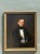 This vintage oil portrait captures a classical gentleman with poised, contemplative presence, skillfully rendered on...