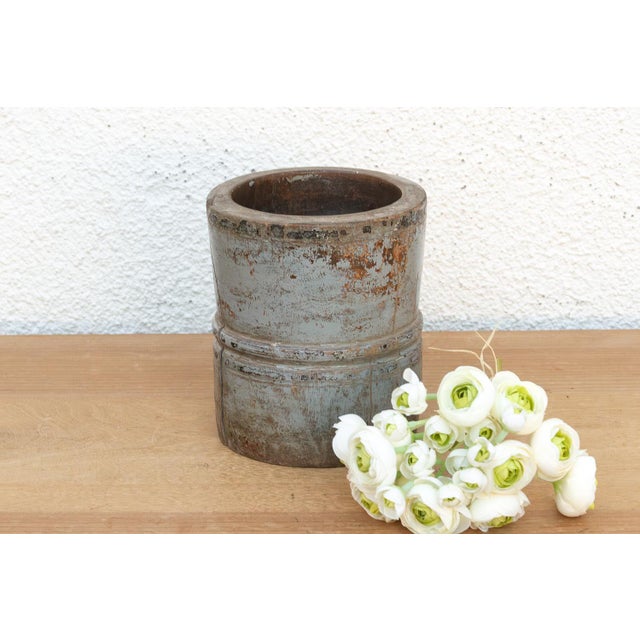 This vintage painted wood vase is a soulful architectural vessel originating from the coastal region of Goa, India. Hand-...