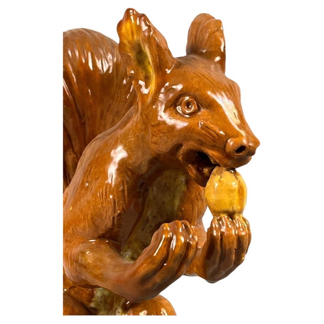 Large Terracotta Majolica Squirrel signed Bavent Normandy. H / 13.5 inches , L / 10.5 by 6.5 inches.